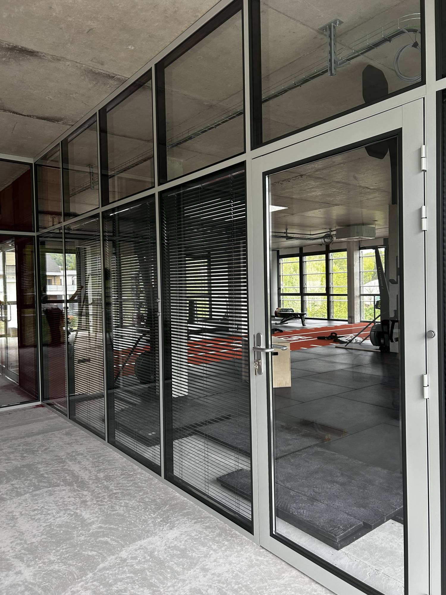 Conception d'une salle de réunion pour un clun de sport à Divonne-les-Bains